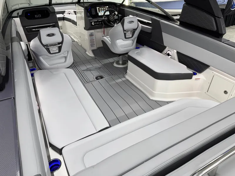 Slide: The Image of Interior of 2025 Chaparral 2870 SSX boat with modern seating and sleek design. - 13