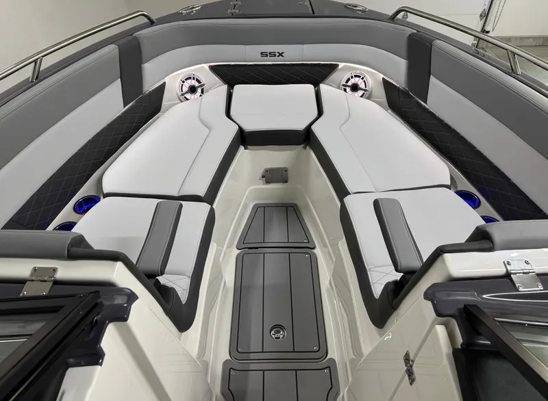 Slide: The Image of 2025 Chaparral 2870 SSX boat interior with sleek gray seating and modern design. - 35