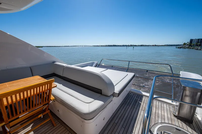 Slide: The Image of Princess Flybridge 64 Motor Yacht 2016, elegant deck seating with ocean view. - 32