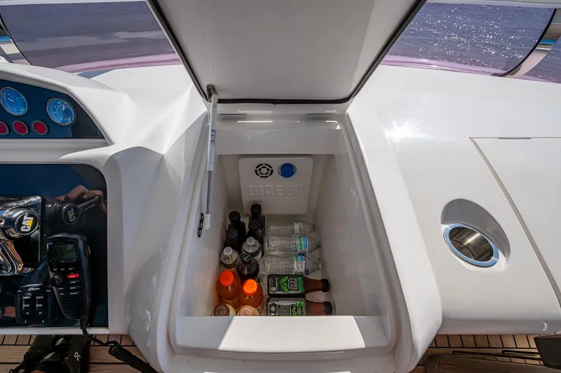 Slide: The Image of Open cooler with drinks on 2016 Princess Flybridge 64 Motor Yacht deck. - 36