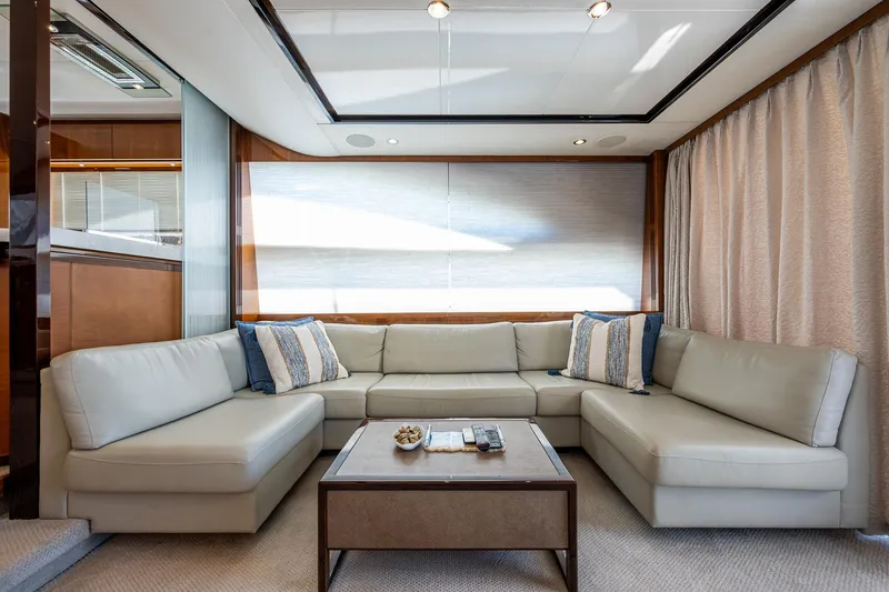 Slide: The Image of Luxurious interior of 2016 Princess Flybridge 64 Motor Yacht with elegant seating area. - 41