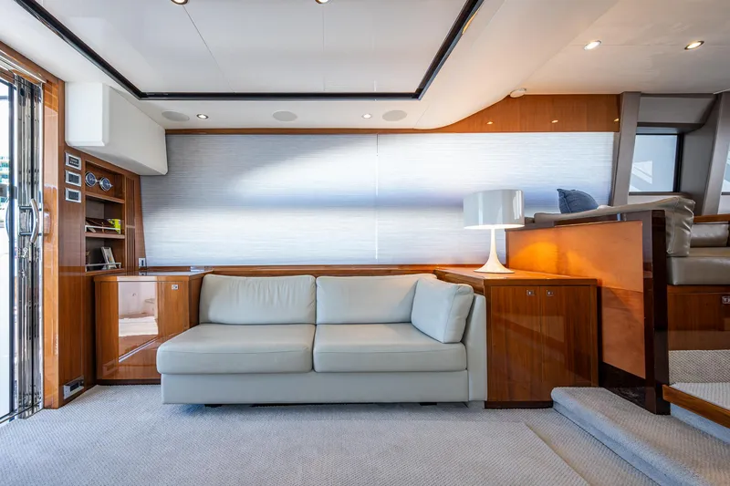 Slide: The Image of Luxurious interior of 2016 Princess Flybridge 64 Motor Yacht with elegant sofa and modern decor. - 42