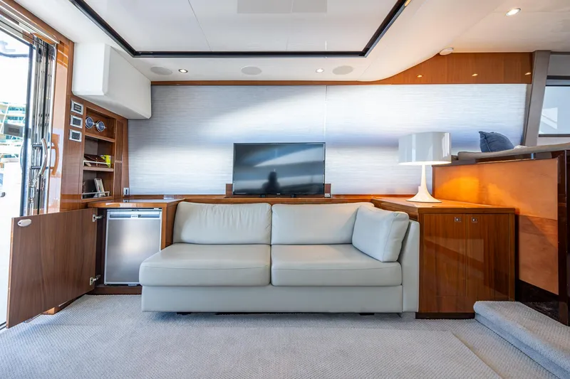 Slide: The Image of Luxurious interior of 2016 Princess Flybridge 64 Motor Yacht with sofa and TV. - 43