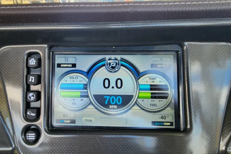 Slide: The Image of Dashboard display of 2016 Premier 290 Grand Entertainer showing RPM and gauges. - 18