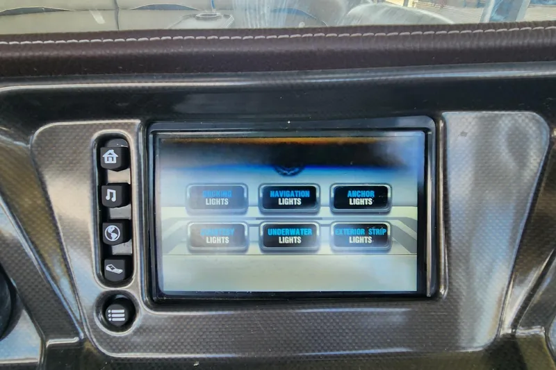 Slide: The Image of Touchscreen control panel on a 2016 Premier 290 Grand Entertainer boat. - 19