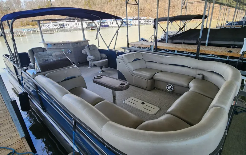 Slide: The Image of 2016 Premier 290 Grand Entertainer pontoon boat with spacious seating and modern amenities. - 5