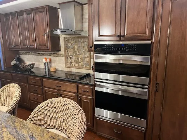 Slide: The Image of Luxurious 2013 Thoroughbred houseboat kitchen with wooden cabinets and modern appliances. - 11