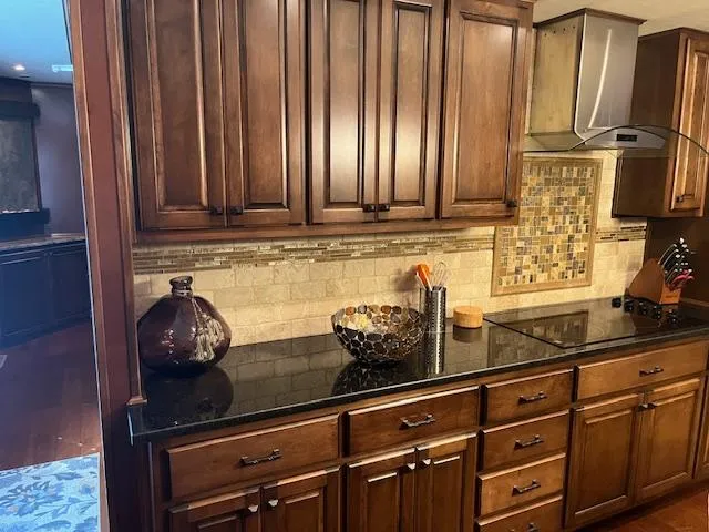 Slide: The Image of Luxurious kitchen in 2013 Thoroughbred houseboat with wooden cabinets and modern decor. - 12