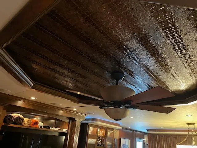 Slide: The Image of Luxurious 2013 Thoroughbred houseboat interior with elegant ceiling and modern fan. - 18