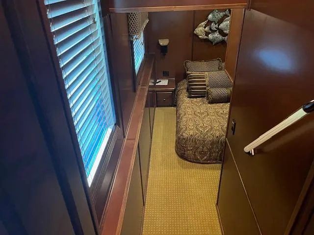 Slide: The Image of Cozy bedroom interior of 2013 Thoroughbred houseboat with elegant decor and soft lighting. - 32