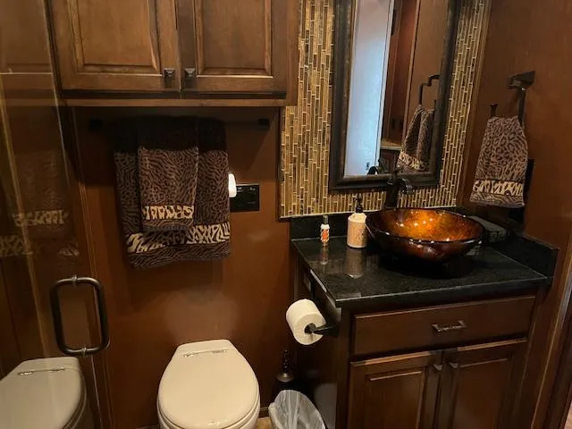 Slide: The Image of Luxurious 2013 Thoroughbred houseboat bathroom with elegant decor and modern amenities. - 37