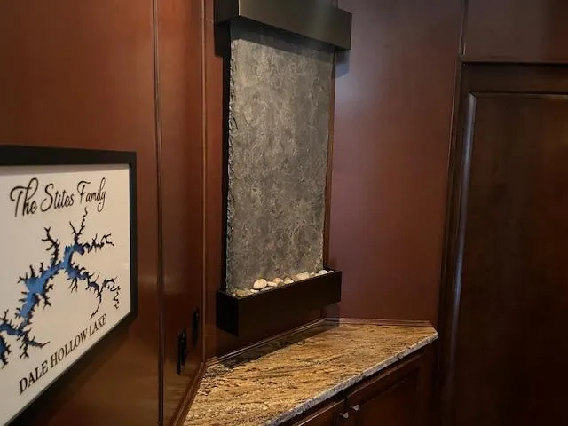 Slide: The Image of Interior of 2013 Thoroughbred houseboat with wall art and granite countertop. - 42