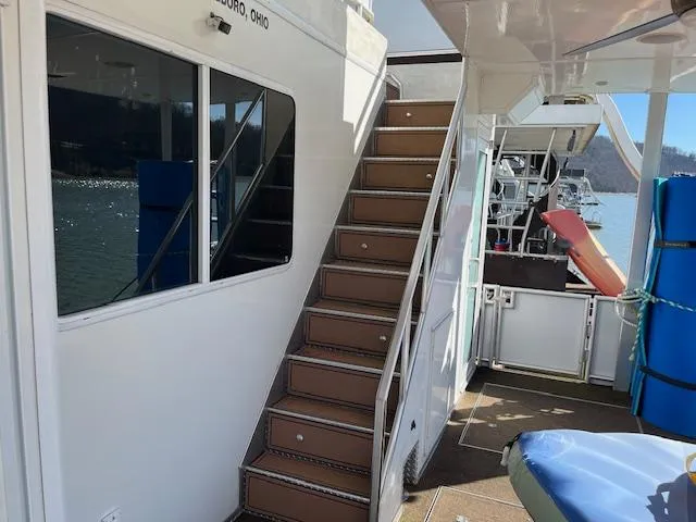 Slide: The Image of 2013 Thoroughbred houseboat with exterior stairs and scenic water view. - 48