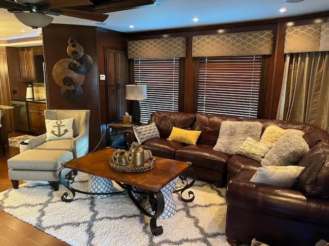 Slide: The Image of Luxurious 2013 Thoroughbred houseboat interior with leather seating and elegant decor. - 9