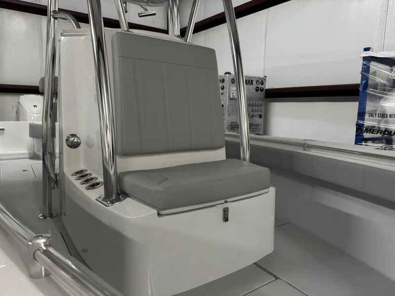 Slide: The Image of 2025 Contender 25 Tournament boat interior with gray seating and sleek design. - 13