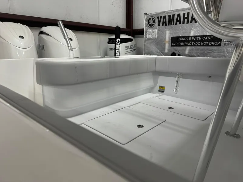Slide: The Image of 2025 Contender 25 Tournament boat interior with Yamaha and Suzuki engines. - 17