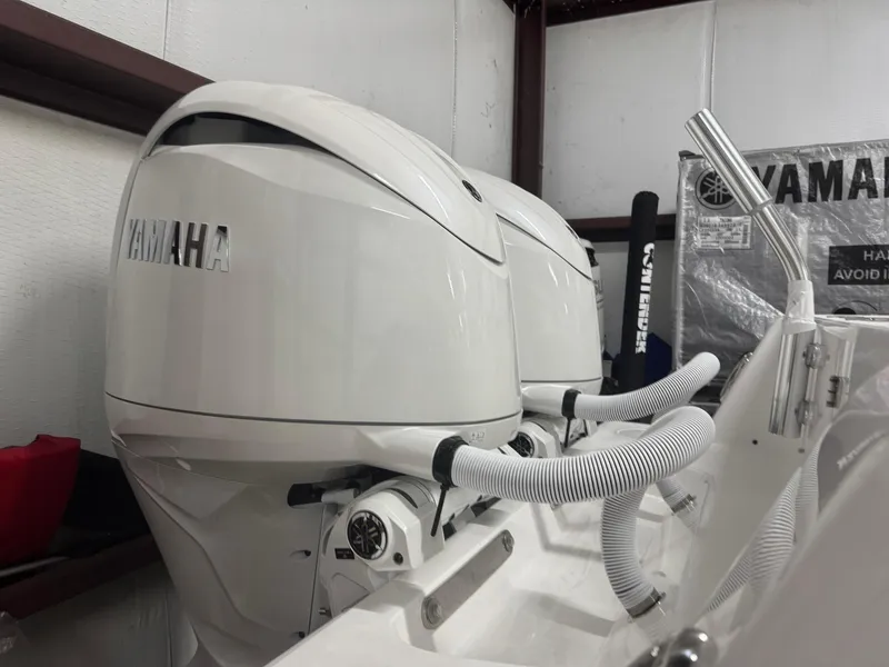 Slide: The Image of Twin Yamaha outboard engines on a 2025 Contender 25 Tournament boat. - 21