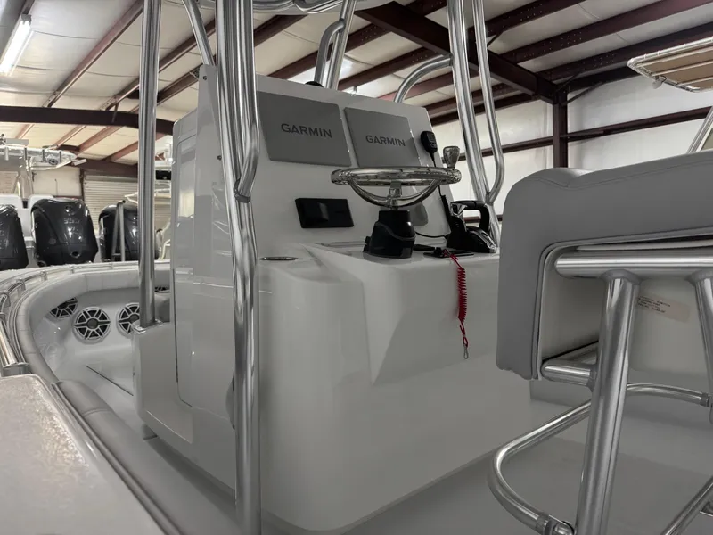 Slide: The Image of 2025 Contender 25 Tournament boat interior with Garmin electronics and sleek design. - 5