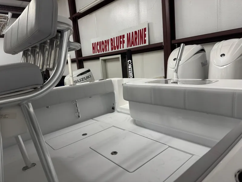 Slide: The Image of 2025 Contender 25 Tournament boat interior at Hickory Bluff Marine showroom. - 7