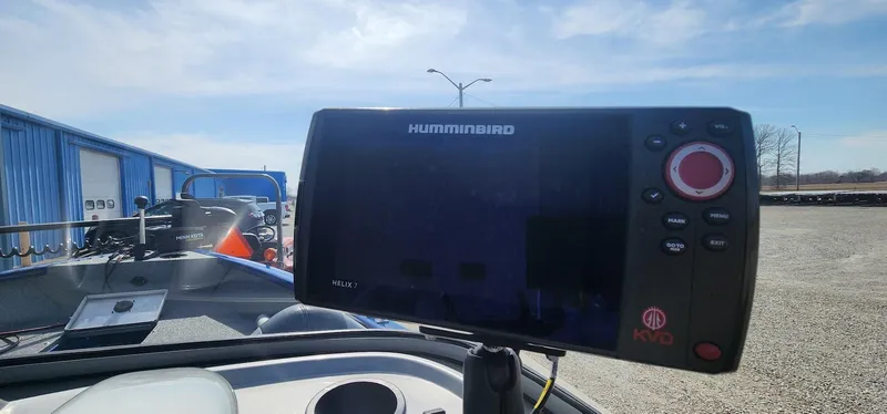 Slide: The Image of Fishfinder on 2016 Tracker Pro Guide V-16 WT boat, parked outdoors. - 8