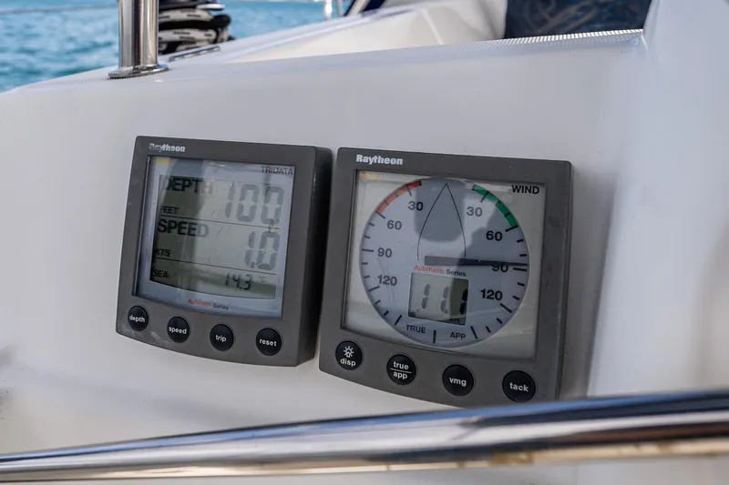 Slide: The Image of Instrumentation panel on a 2001 Jeanneau Sun Odyssey 40 sailboat, displaying depth and wind speed. - 21