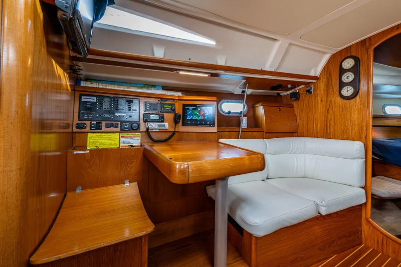 Slide: The Image of Interior of 2001 Jeanneau Sun Odyssey 40 yacht with navigation station and seating area. - 30