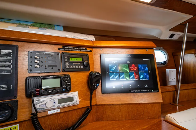 Slide: The Image of Navigation equipment on a 2001 Jeanneau Sun Odyssey 40 sailboat, featuring modern controls and displays. - 31