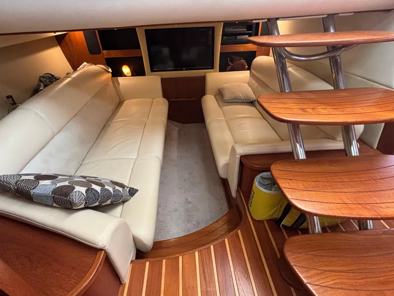 Slide: The Image of 2008 Tiara Yachts 3900 Sovran interior with leather seating and wooden steps. - 30
