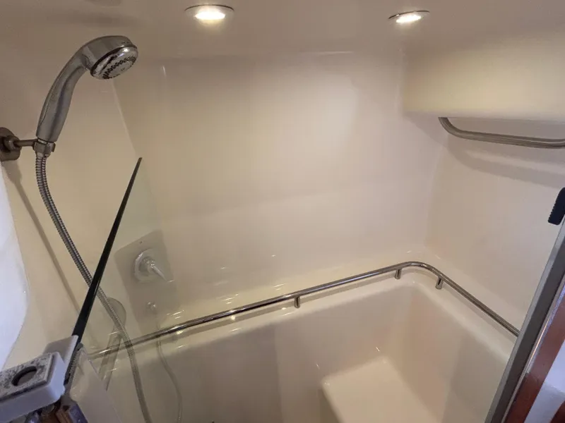 Slide: The Image of Shower area in 2008 Tiara Yachts 3900 Sovran, featuring modern fixtures and lighting. - 32