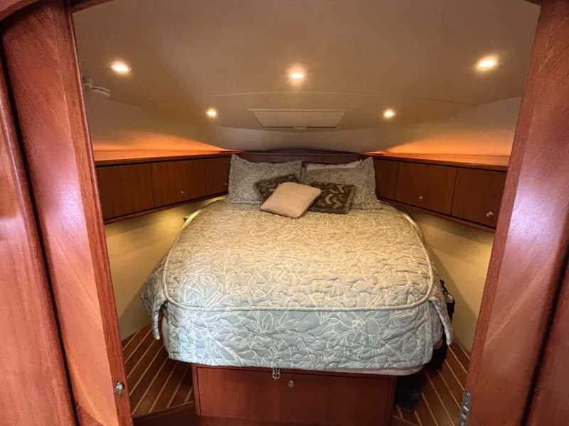 Slide: The Image of Luxurious cabin interior of 2008 Tiara Yachts 3900 Sovran with cozy bedding. - 36