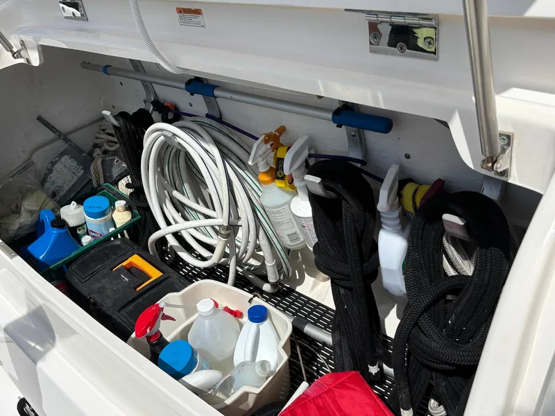 Slide: The Image of Storage compartment of 2008 Tiara Yachts 3900 Sovran with cleaning supplies and equipment. - 44