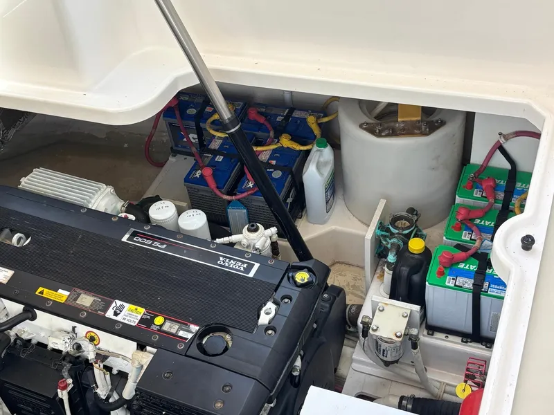 Slide: The Image of Engine compartment of a 2008 Tiara Yachts 3900 Sovran, featuring batteries and maintenance equipment. - 45