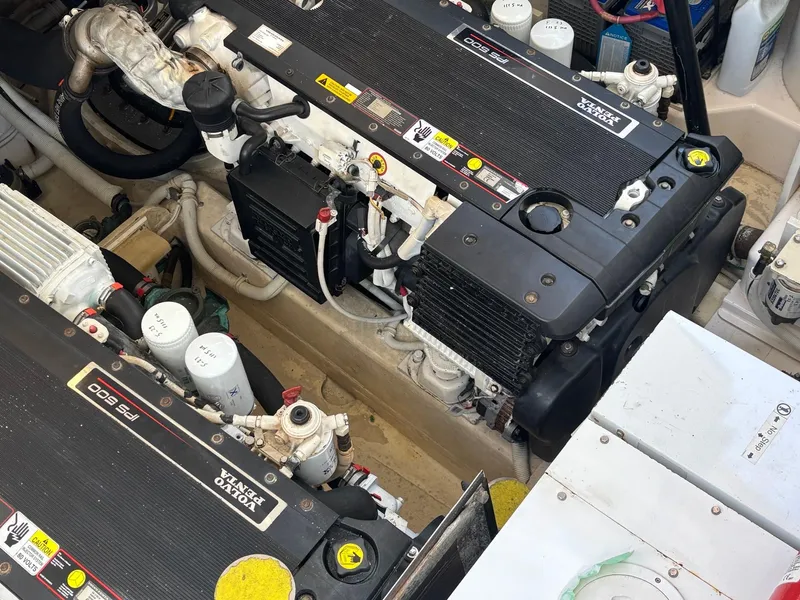 Slide: The Image of Engine room of a 2008 Tiara Yachts 3900 Sovran, showcasing dual diesel engines. - 46
