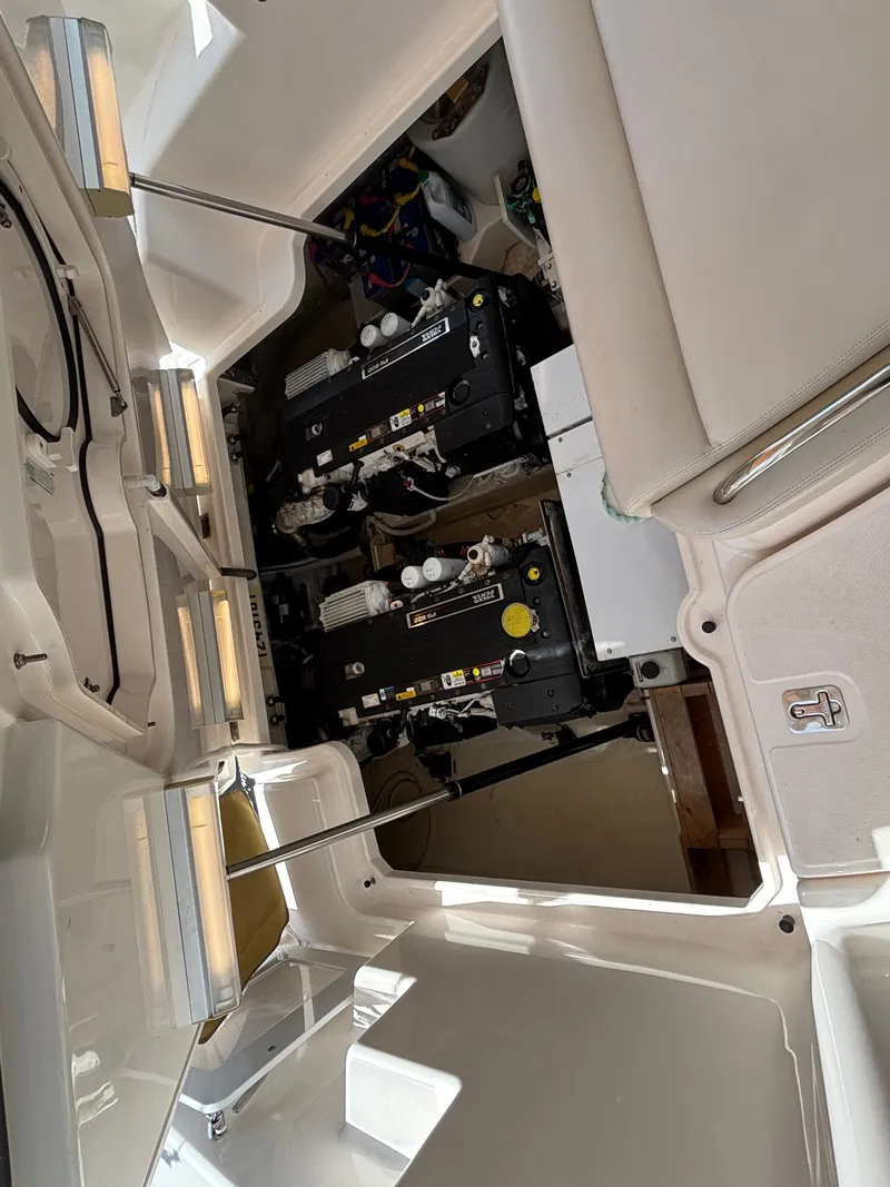 Slide: The Image of Engine compartment of 2008 Tiara Yachts 3900 Sovran, showcasing mechanical components. - 49
