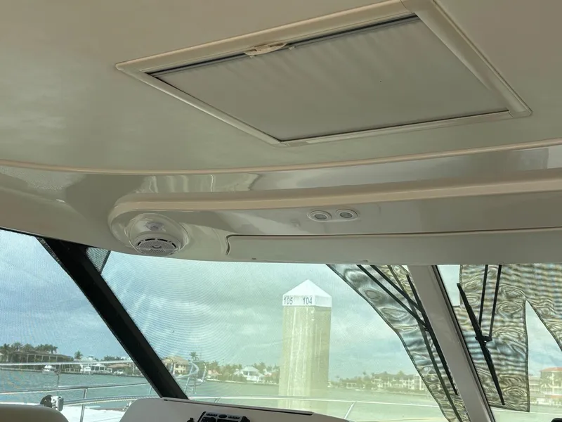 Slide: The Image of Interior view of 2008 Tiara Yachts 3900 Sovran, featuring ceiling and windows. - 6