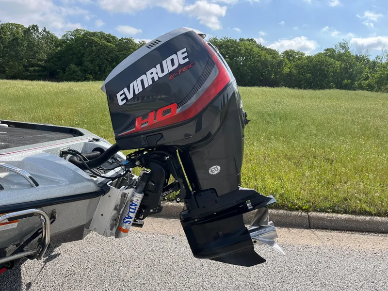 Slide: The Image of Close-up of a shiny metal boat propeller with engraved numbers, suitable for a 2013 Ranger Z520C. - 11