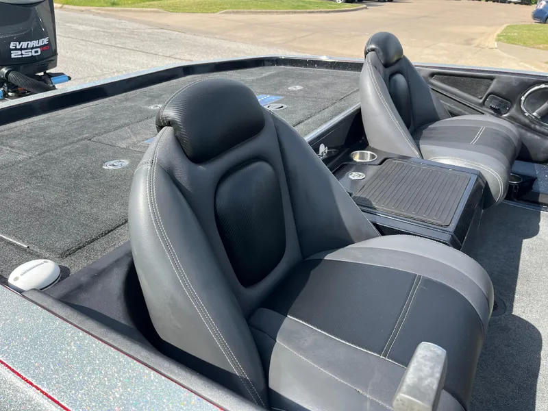 Slide: The Image of 2013 Ranger Z520C boat on trailer, parked on roadside under clear sky. - 14