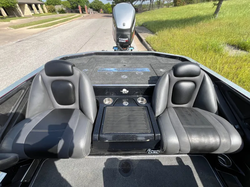 Slide: The Image of 2013 Ranger Z520C storage compartment with open hatch, showing interior space. - 34