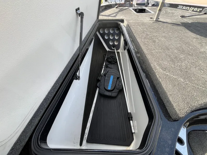 Slide: The Image of Storage compartment in 2013 Ranger Z520C boat, open and empty. - 39