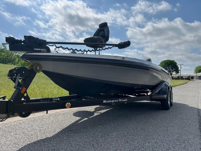 Slide: The Image of 2013 Ranger Z520C fishing boat on trailer, parked on a sunny road. - 5