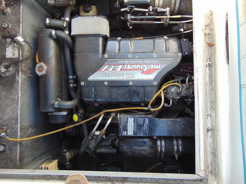 Slide: The Image of Engine compartment of a 1995 Sea Ray 290DA with MerCruiser engine. - 8