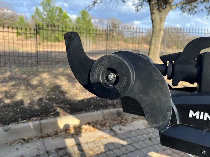 Slide: The Image of 2021 Ranger VS1782 WT boat motor propeller in a park setting. - 21