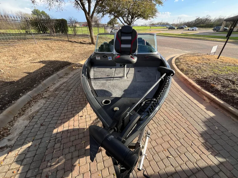 Slide: The Image of 2021 Ranger VS1782 WT boat parked on a cobblestone driveway. - 22