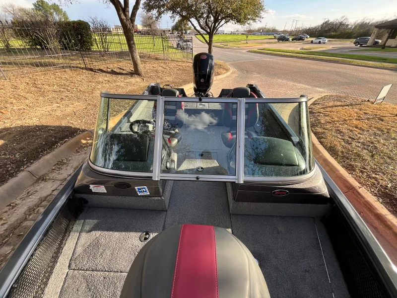 Slide: The Image of 2021 Ranger VS1782 WT boat with windshield, parked on a sunny day. - 28