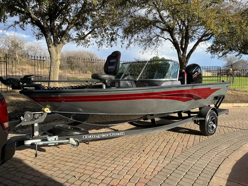 Slide: The Image of 2021 Ranger VS1782 WT fishing boat on trailer, parked outdoors. - 3