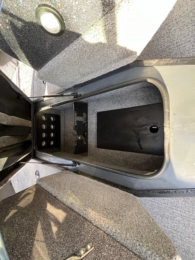 Slide: The Image of 2021 Ranger VS1782 WT boat interior storage compartment with textured flooring. - 34