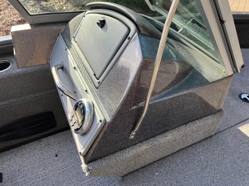 Slide: The Image of 2021 Ranger VS1782 WT boat dashboard with steering wheel and windshield. - 40