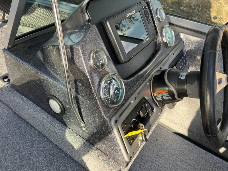 Slide: The Image of 2021 Ranger VS1782 WT boat dashboard with gauges and navigation system. - 41