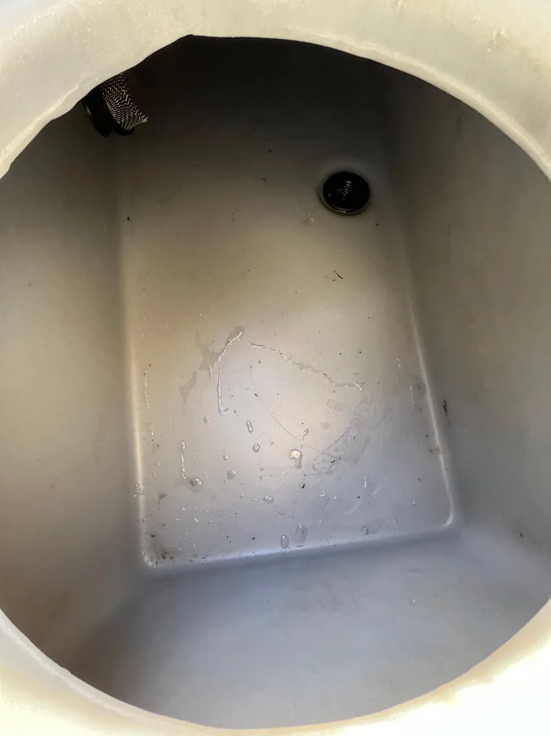 Slide: The Image of 2021 Ranger VS1782 WT boat compartment interior, showing clean, empty storage space. - 46