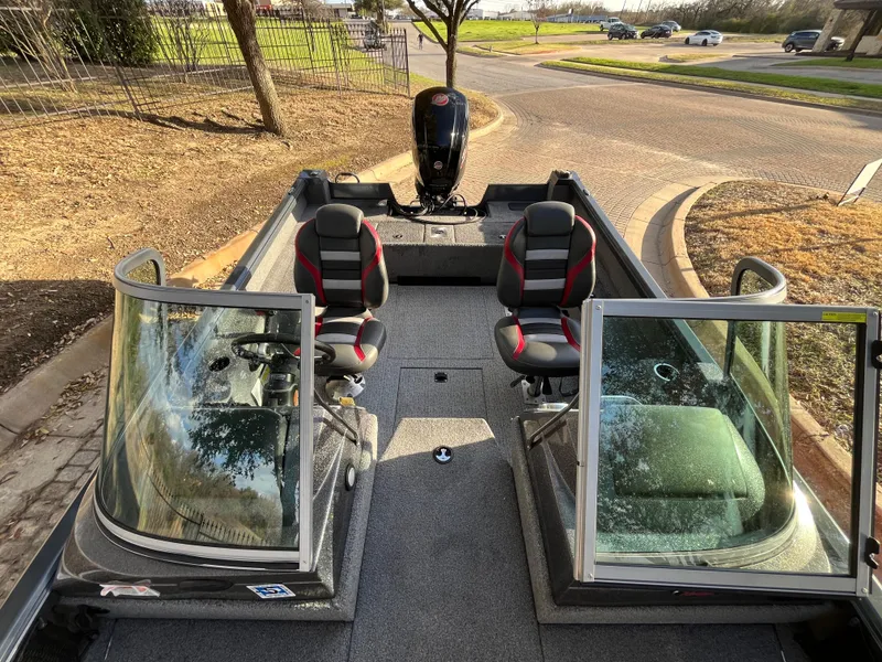 Slide: The Image of 2021 Ranger VS1782 WT boat interior with two seats and open windshield. - 50